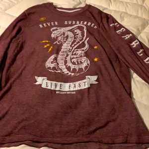 Cool long sleeve Fearless burgundy colored tee from Fifth Sun